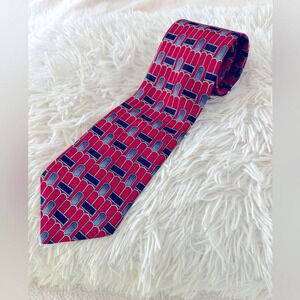 Men’s 100% Silk, Imported from Italy neck tie. Red, blue shapes trimmed in white